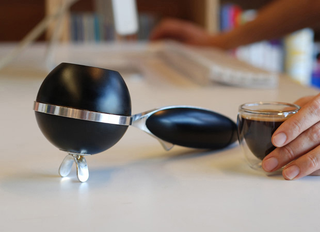 Illustration for article titled World's First Portable Espresso Machine Now Available for US Caffeine Addicts